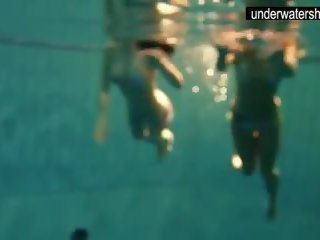Two alluring Amateurs Showing Their Bodies off Under Water